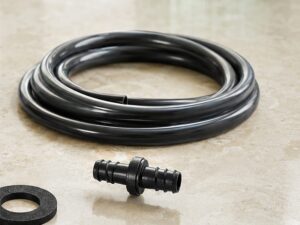 Coiled food-grade tubing with barbed connector fittings